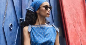 The Scarf Top Has Outgrown the Actual Scarf Colorful silk scarves arranged as fashion accessories on a neutral background