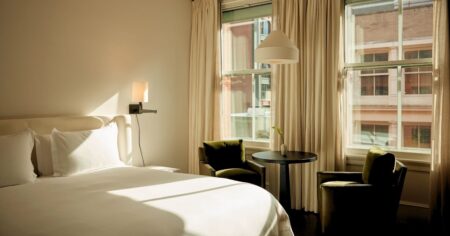 The Mercer, Soho: Where the City Stops at the Door A warm, minimal hotel lobby with soft lighting and clean architectural lines