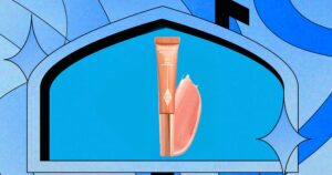 Charlotte Tilbury Joins Prime Day With Discounts Up to 40% Off Luxury makeup products arranged on a vanity surface