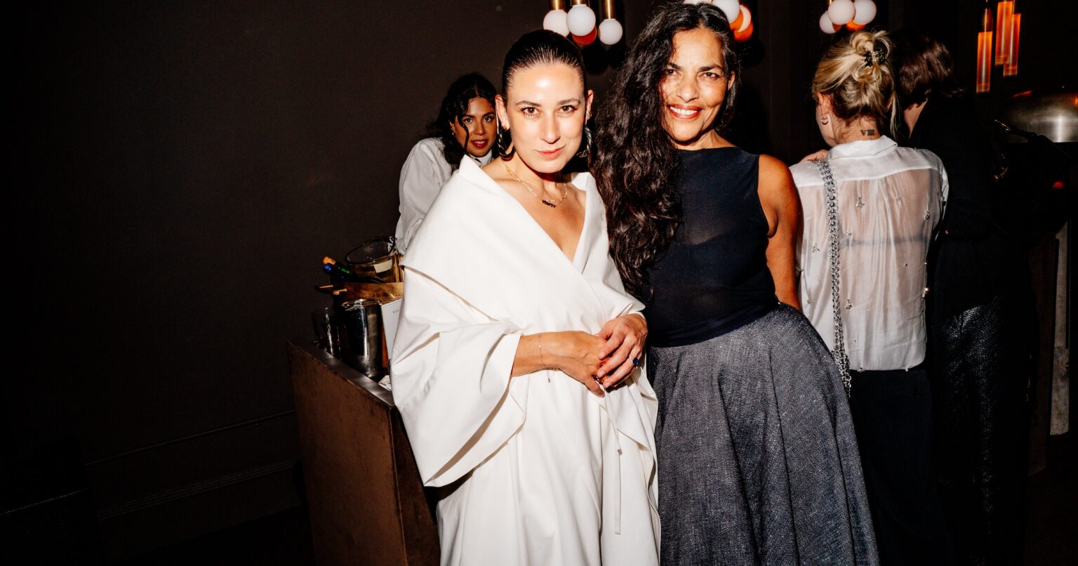 Cafe Kallmeyer Was One Night Only, and Everyone Dressed Accordingly Guests in stylish outfits at an intimate evening birthday party
