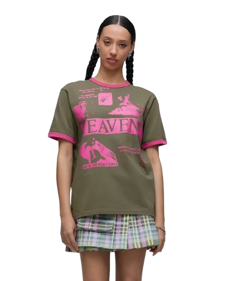 High-contrast flash photo portrait of a young woman with smudged eyeliner and casual clothing