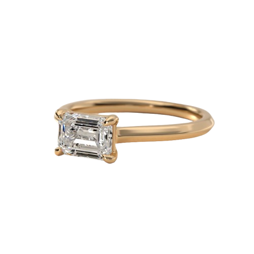 Hand wearing a statement diamond engagement ring with architectural setting