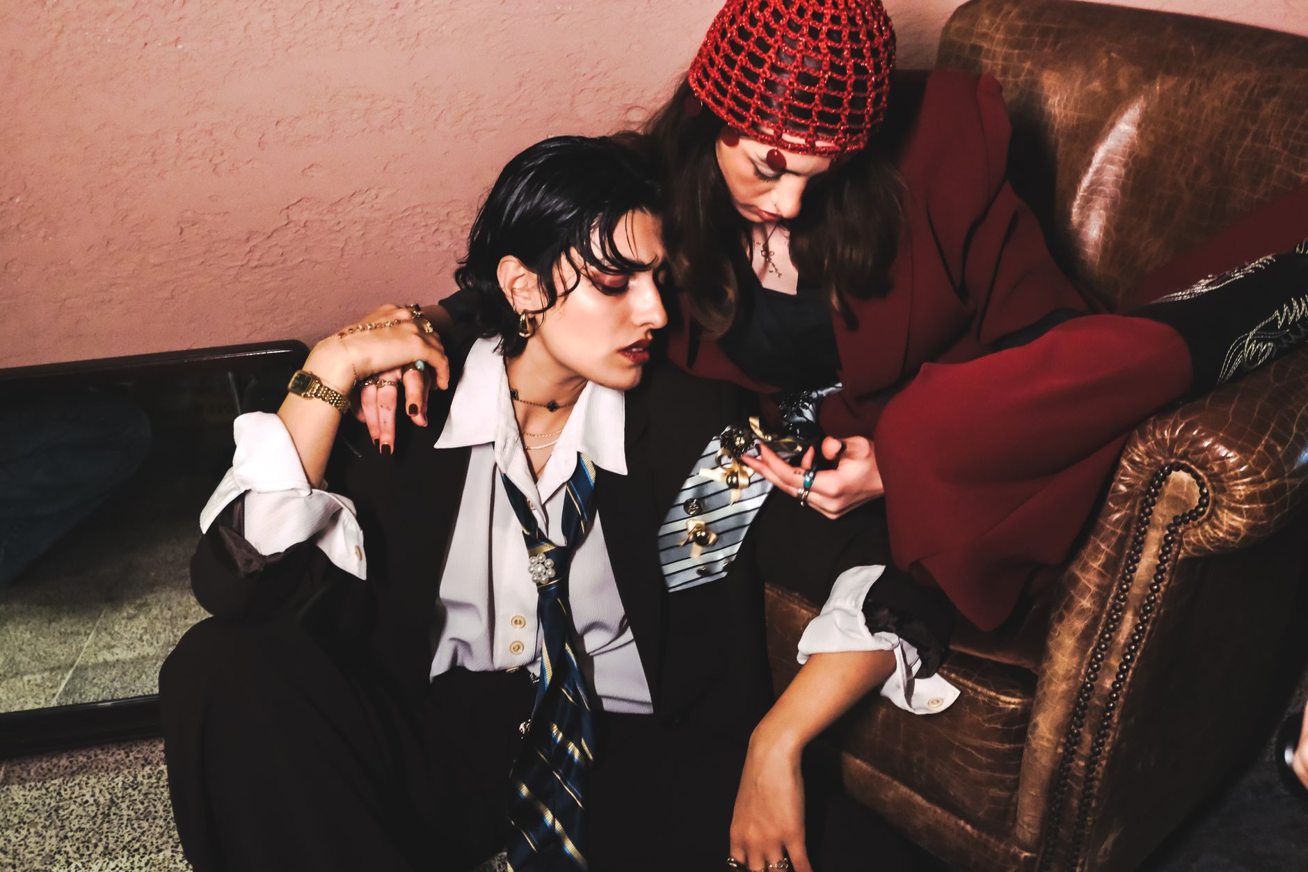 Group of women comparing and styling gold bracelets together