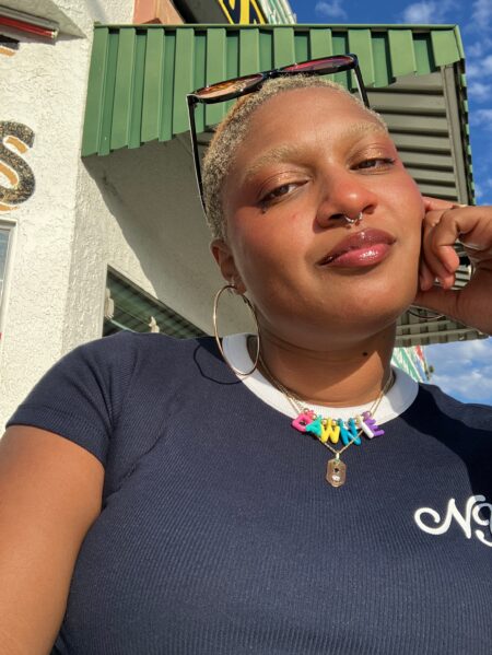At 36, Three Years Without a Date — and Grieving It Woman sitting alone watching TV in a dimly lit living room