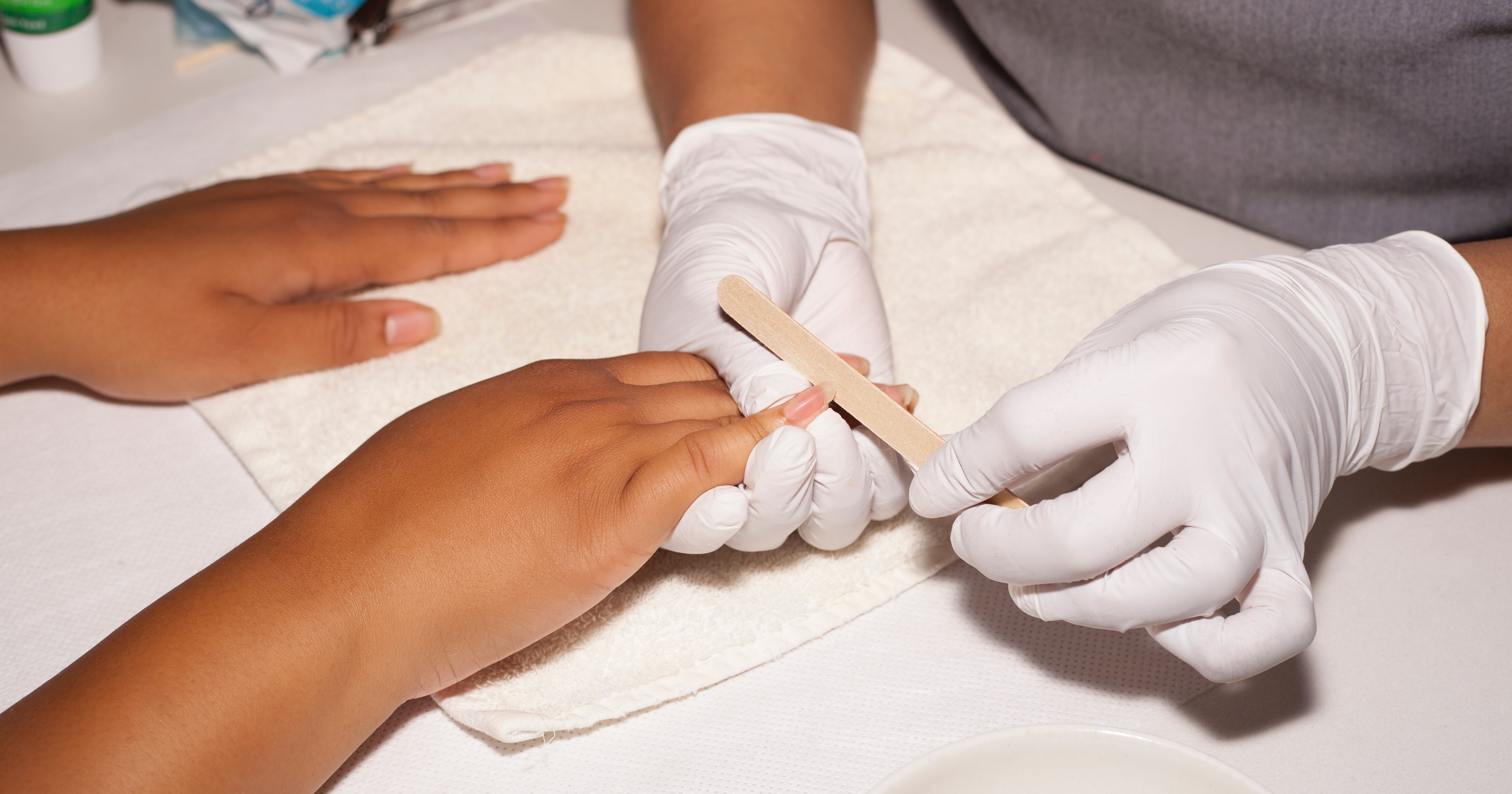 Close-up of bare, buffed natural nails without polish