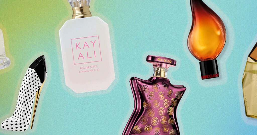 Milky Caramel To Citrus Oud: The 12 New Fragrances Worth Wearing This July Several glass perfume bottles arranged on a sunny surface with warm light
