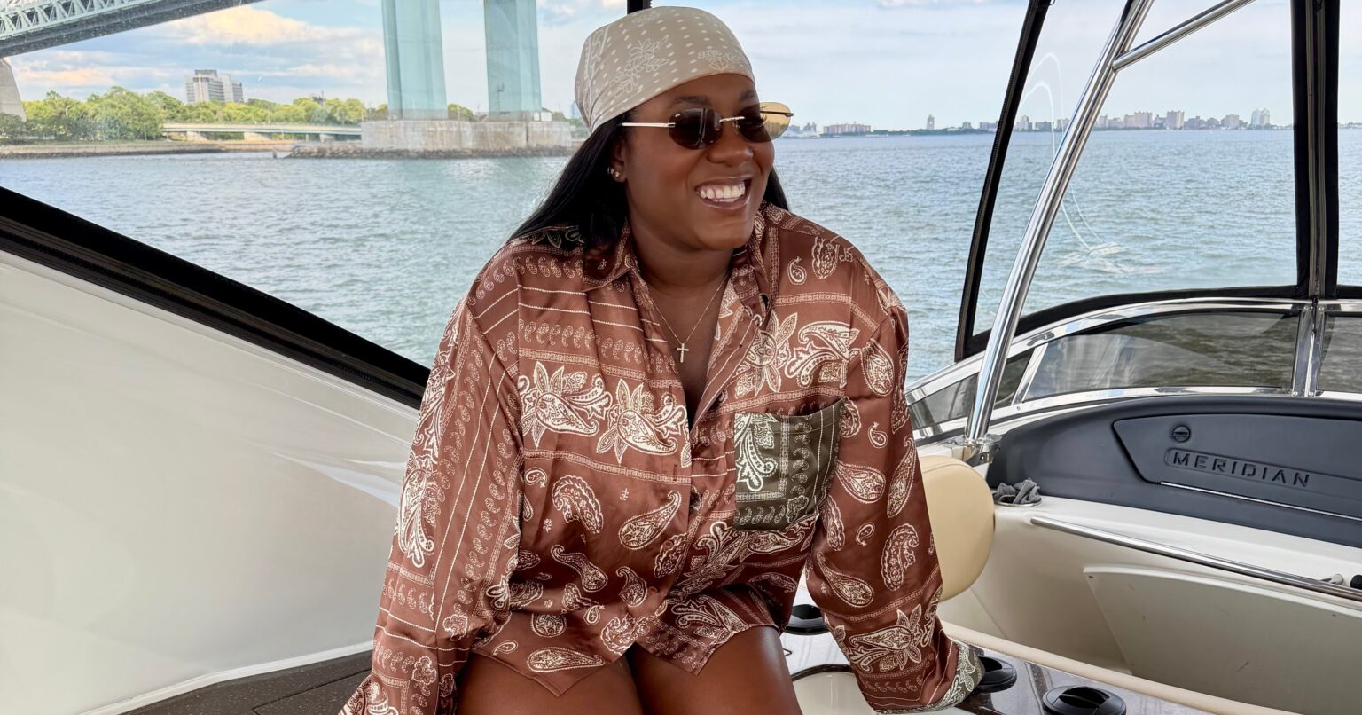 Issa Rae Called It Yacht Shit — She Was Right Friends gathered on the deck of a luxury yacht on a sunny summer day