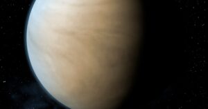 Venus Enters Virgo: Put Your Guard Up From July 9 Woman writing in a journal at a sunlit table, reflecting quietly