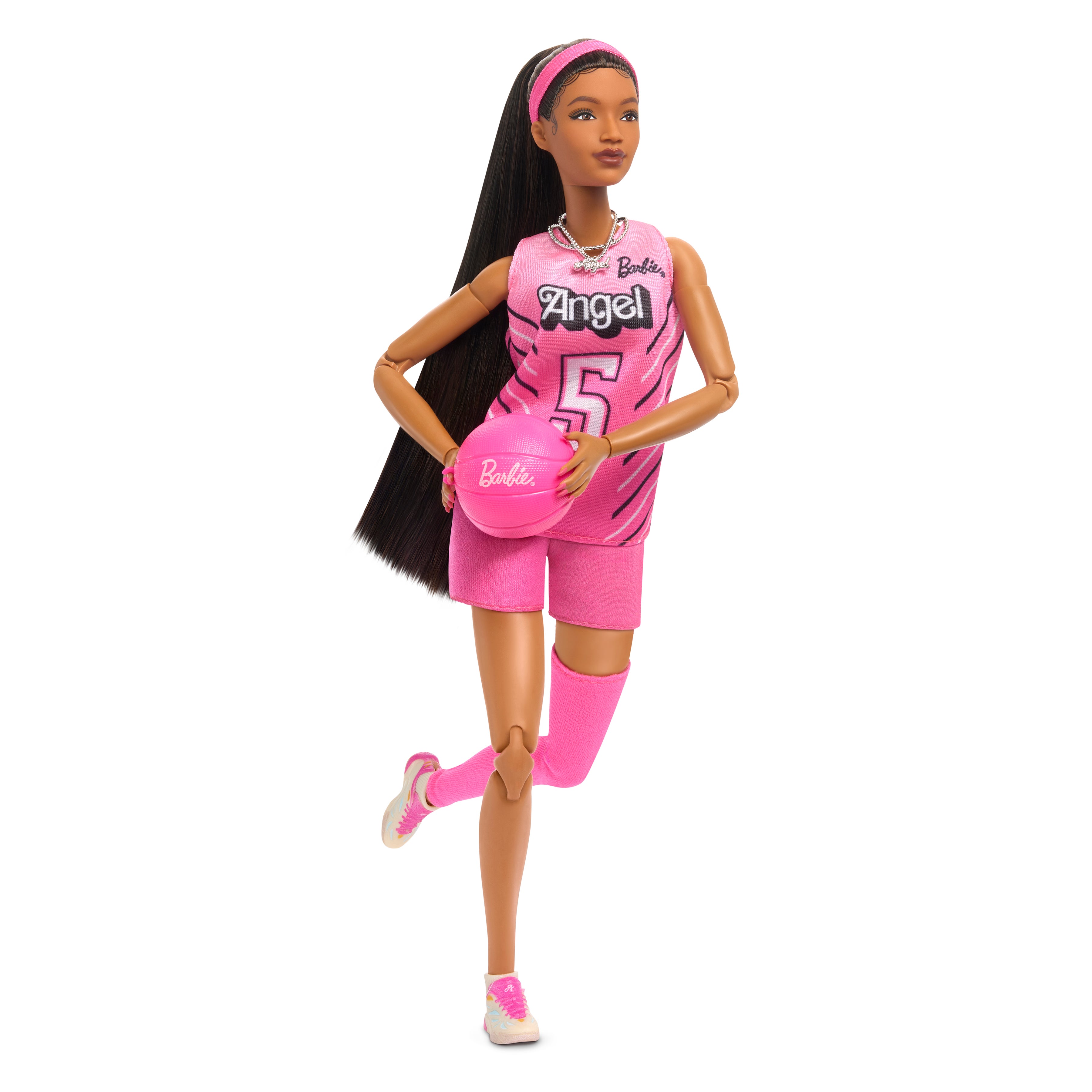 A collectible fashion doll displayed in its packaging on a shelf