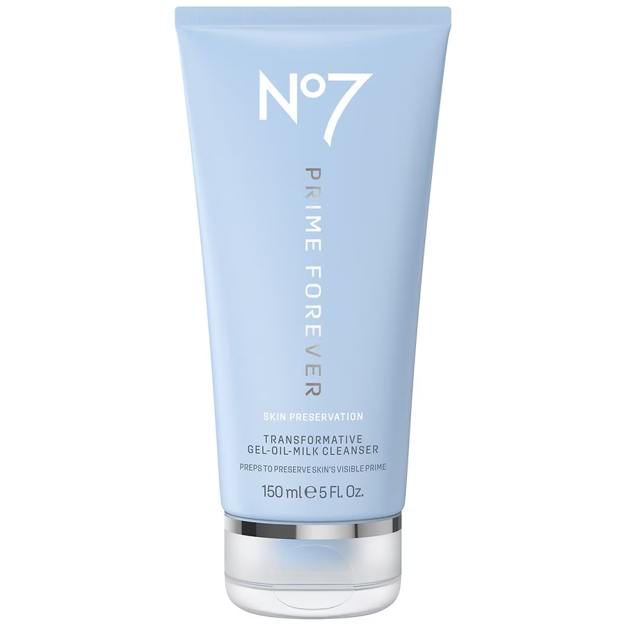 Closeup of skincare serum dropper against clean background