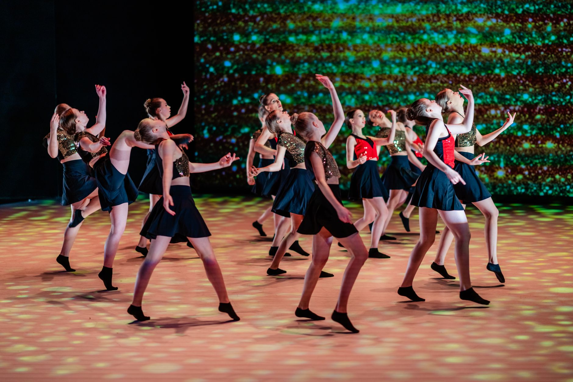 Young performers on stage at a live entertainment event