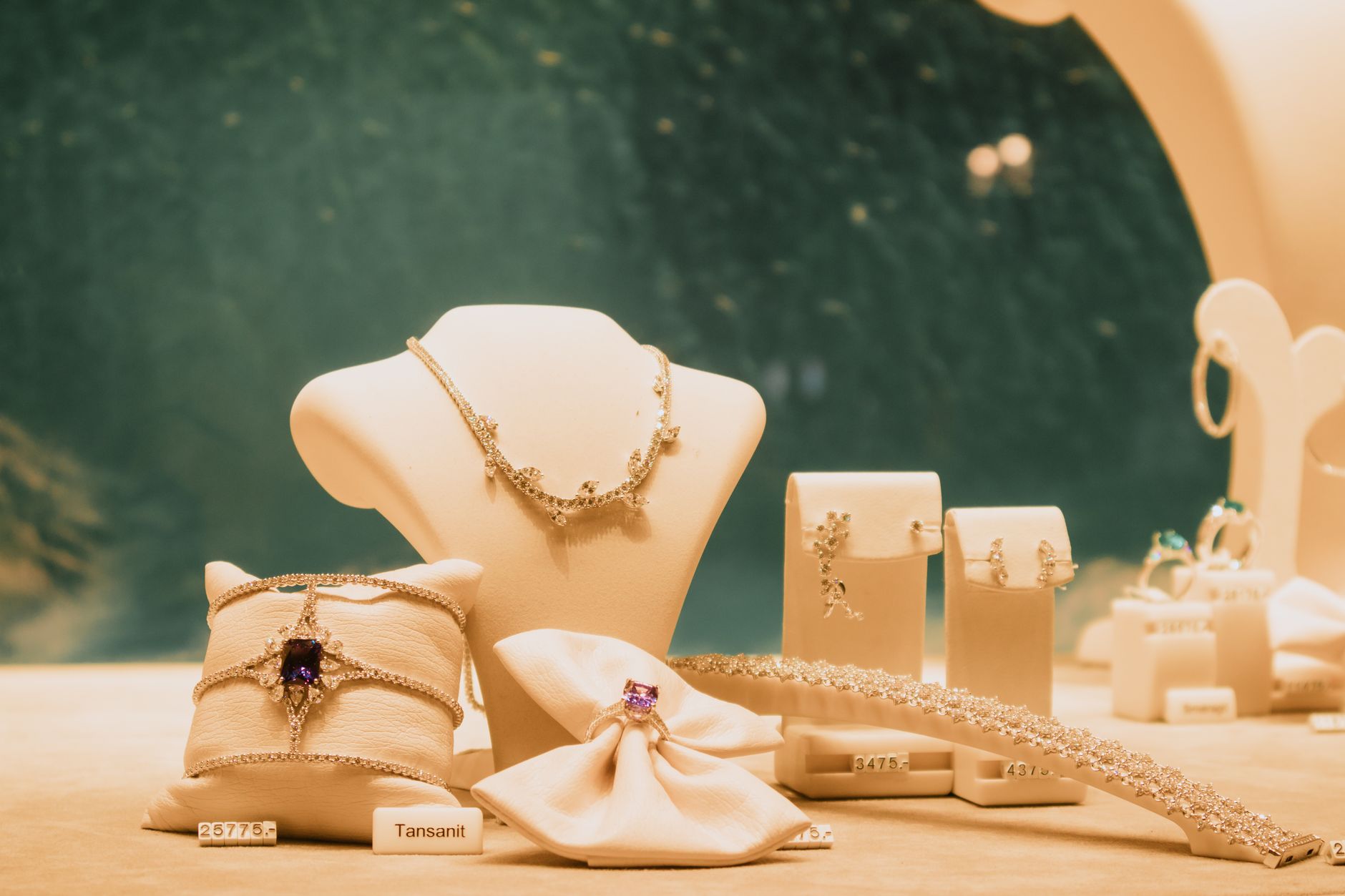 Curated luxury accessories and jewelry arranged at an independent designer showcase