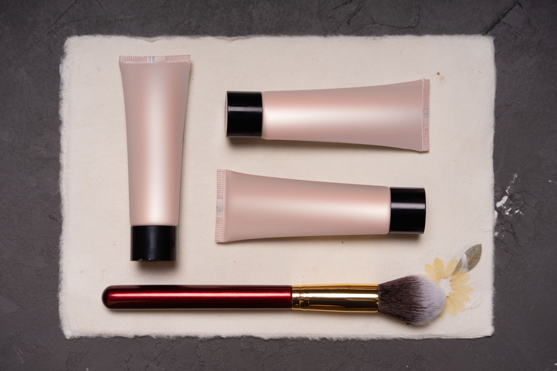 Beauty and makeup products arranged on a flat surface