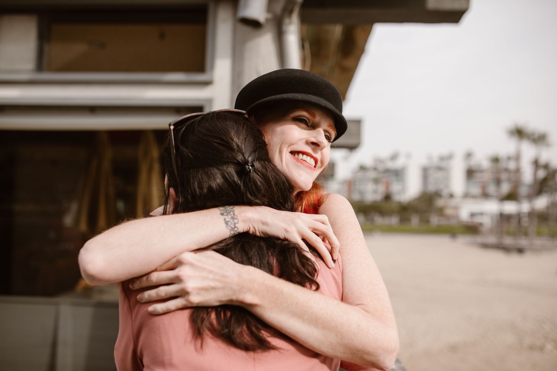 Two friends embracing in a moment of emotional support