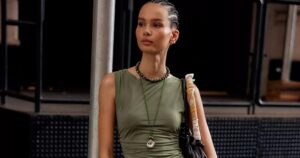 Drawstring Pants Are Quietly Outselling Every Other Trouser Right Now Woman wearing relaxed wide-leg drawstring trousers styled with a simple top