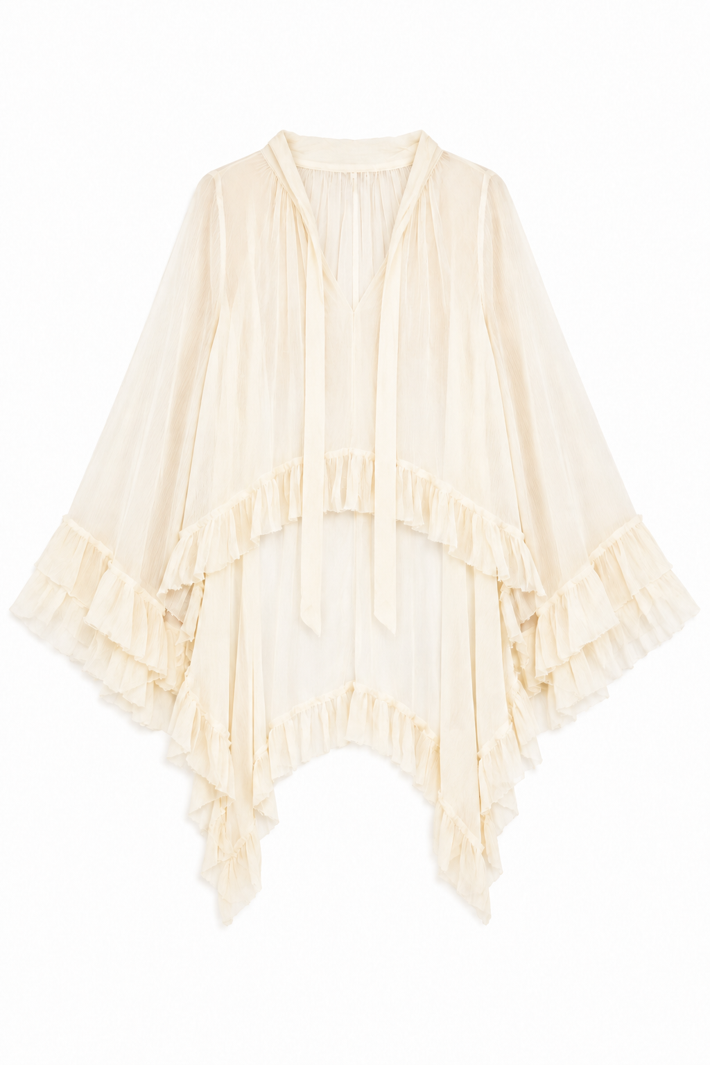 A street style outfit combining a feminine blouse with relaxed wide-leg trousers and a structured hat