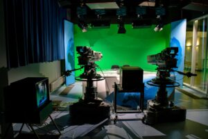 Gia Giudice Shines at Next Gen NYC Reunion Bright studio lights set up for a television taping