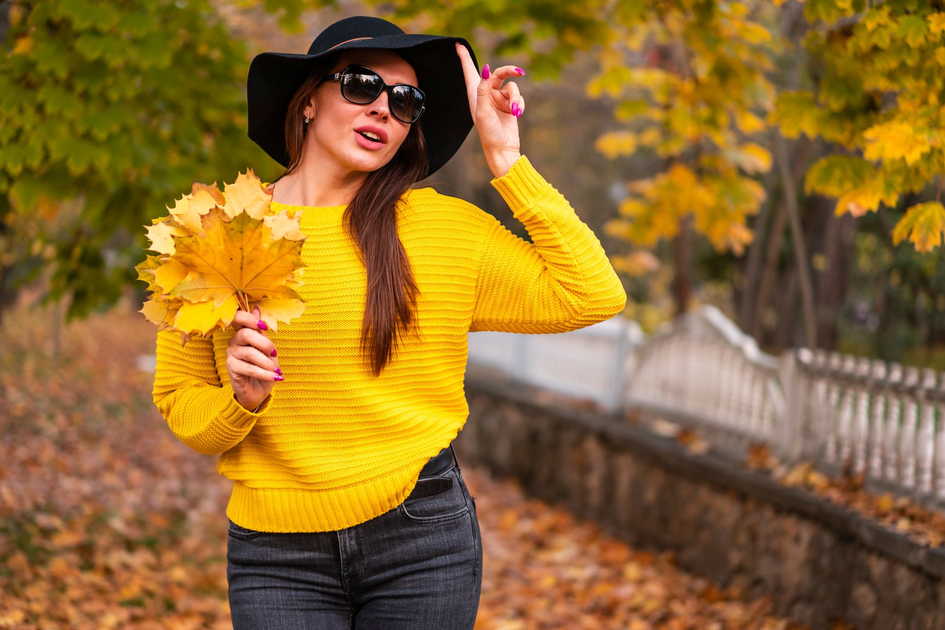 Fall outfit with warm tones including rust and brown layered knits