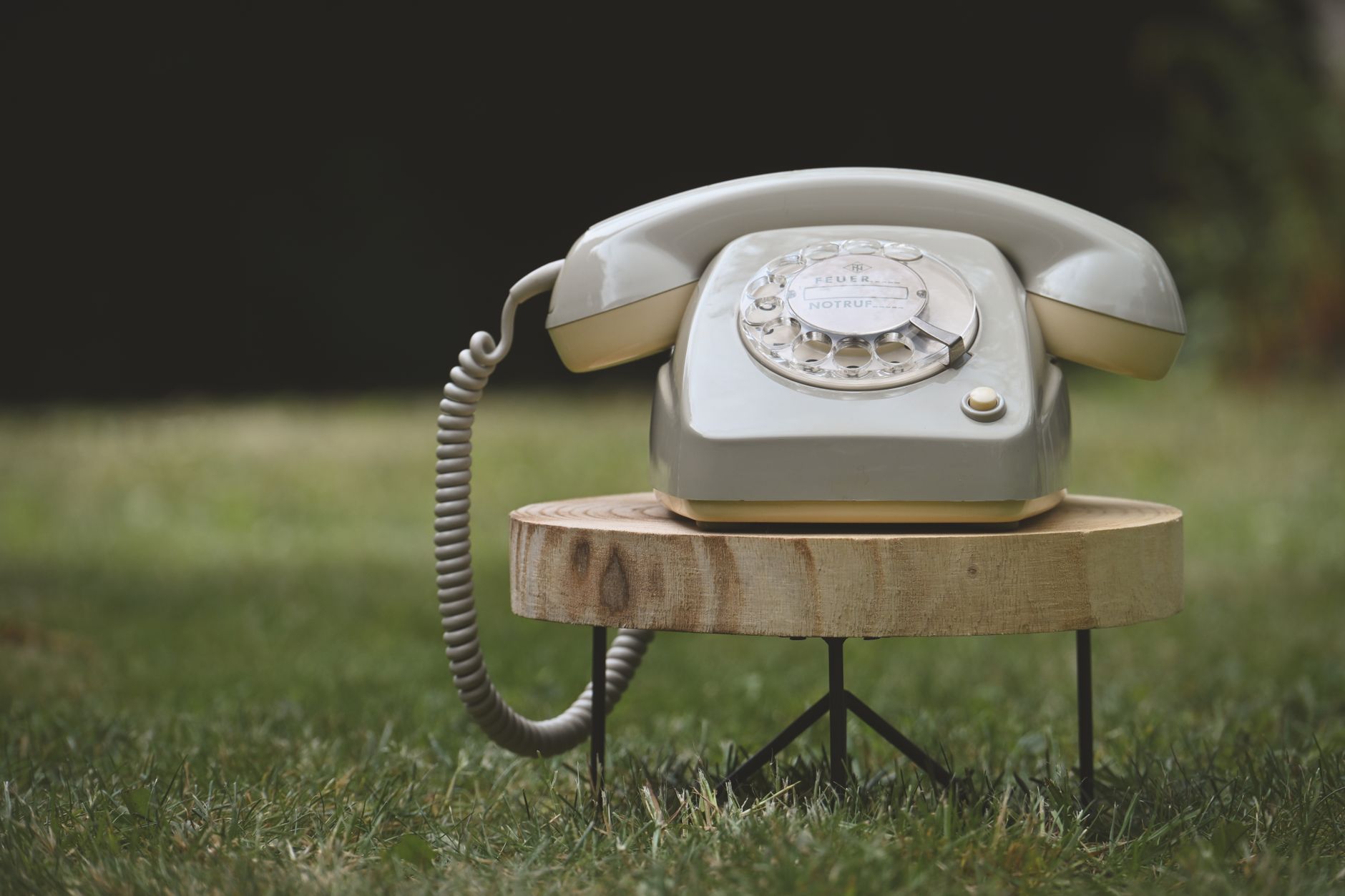 Old-fashioned landline telephone on a desk evoking pre-internet simplicity