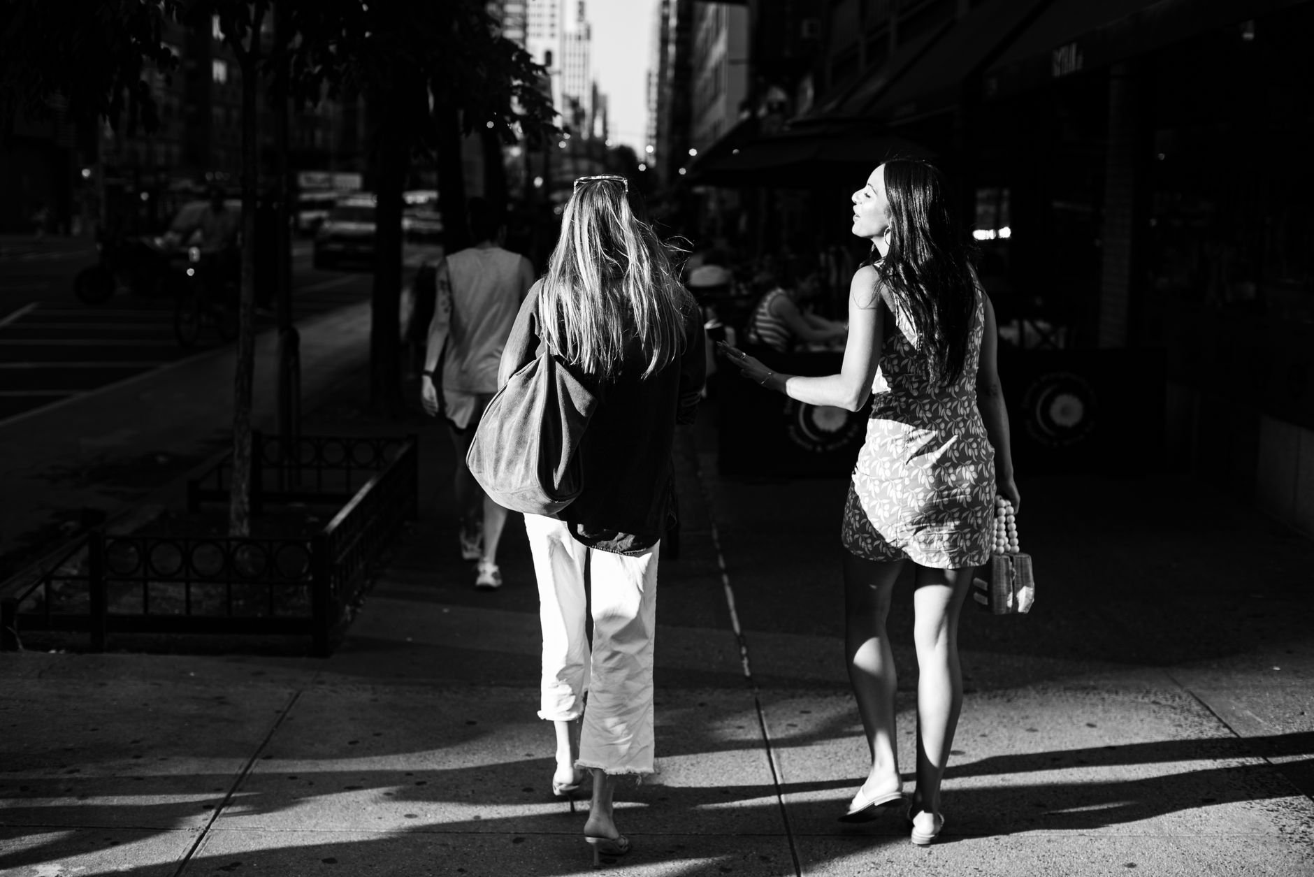 Well-dressed pedestrians near a fashion show venue in Manhattan