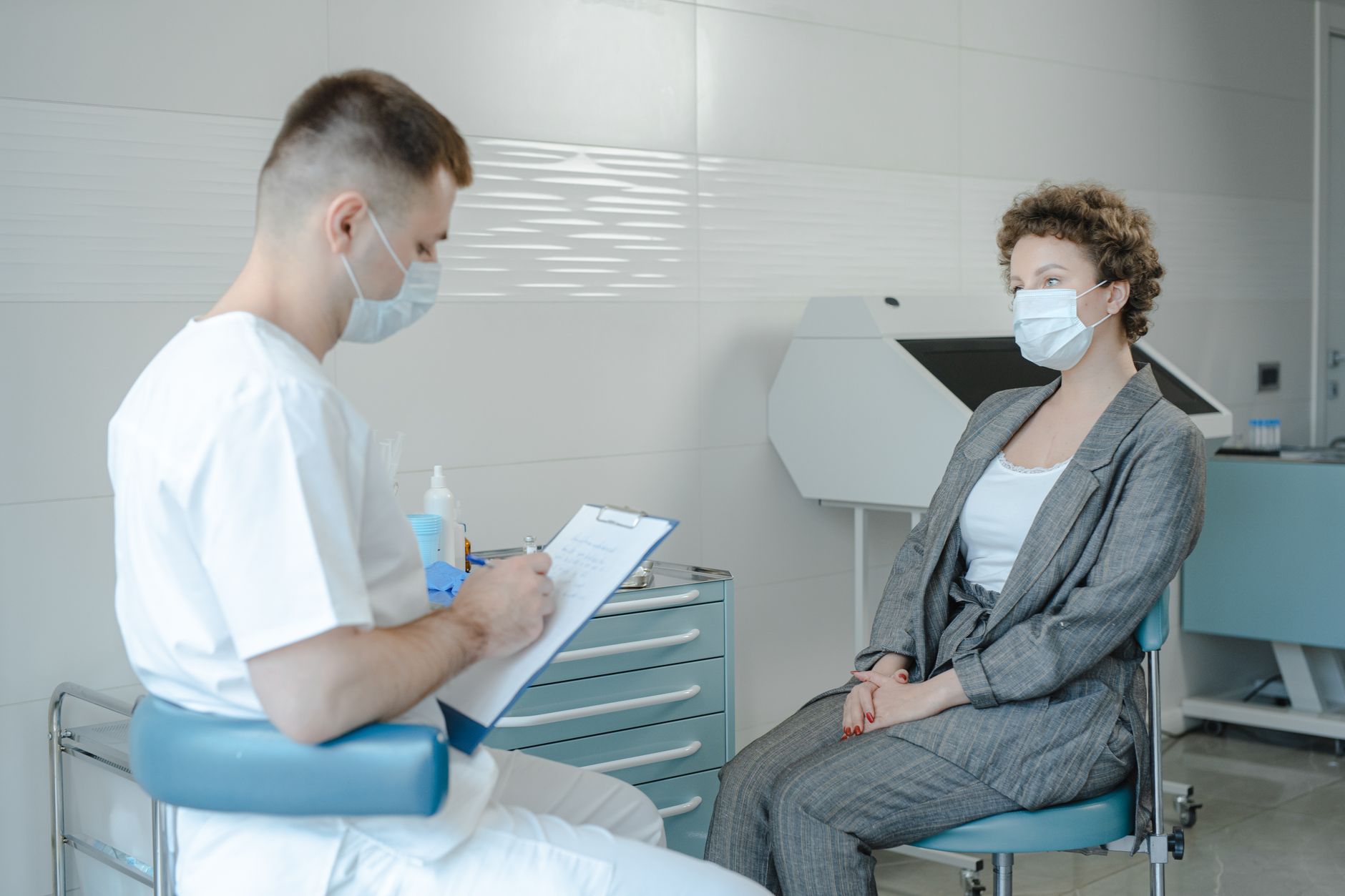 Woman speaking with a doctor during a medical consultation appointment