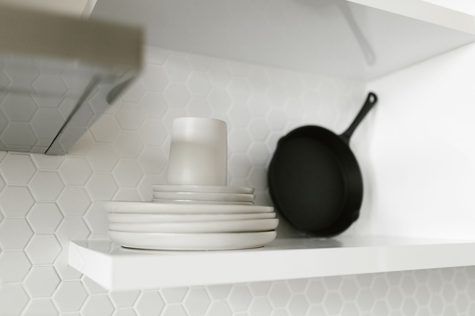 Modern cookware set arranged on a kitchen counter