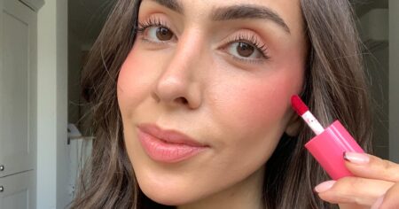 e.l.f.’s New Lip & Cheek Stain Is Sheer, Long-Lasting, & Only $6 Close-up of pink and berry toned makeup blush products on a white surface