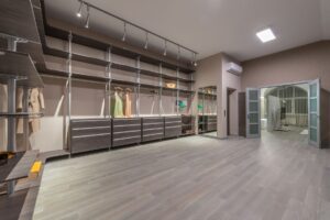 Your Closet Is Full and You Have Nothing to Wear A full closet with clothes hanging on a rack, viewed from the front