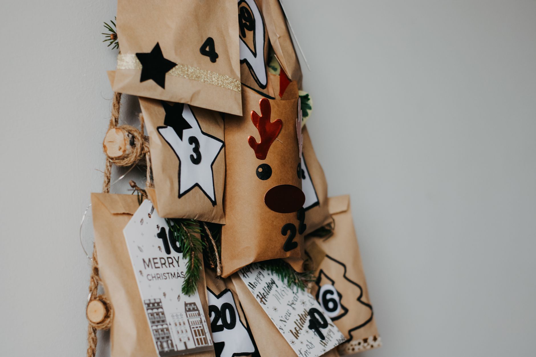 Wooden advent calendar with small numbered doors open for December countdown