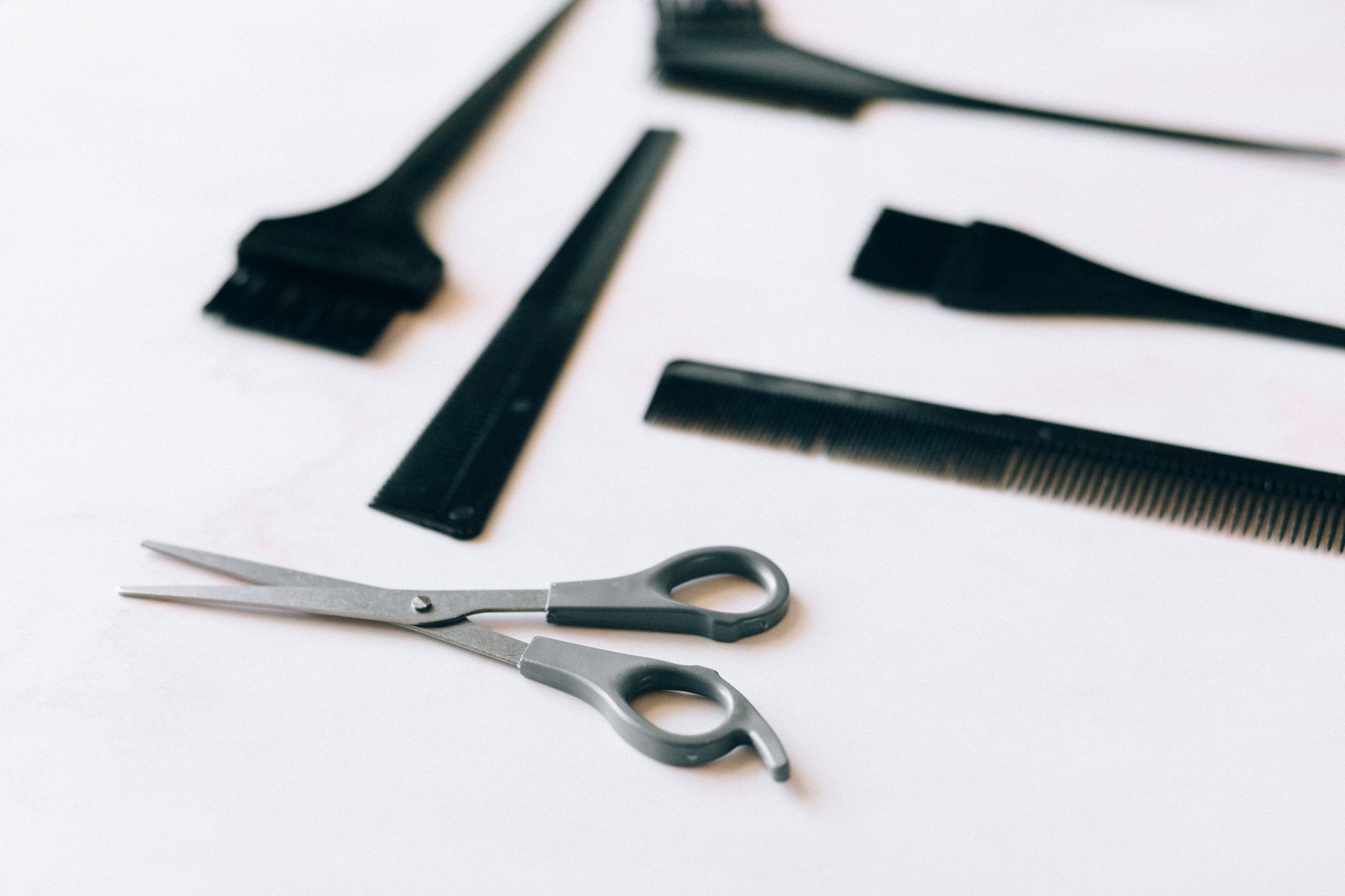 Professional hair styling tools on a vanity countertop