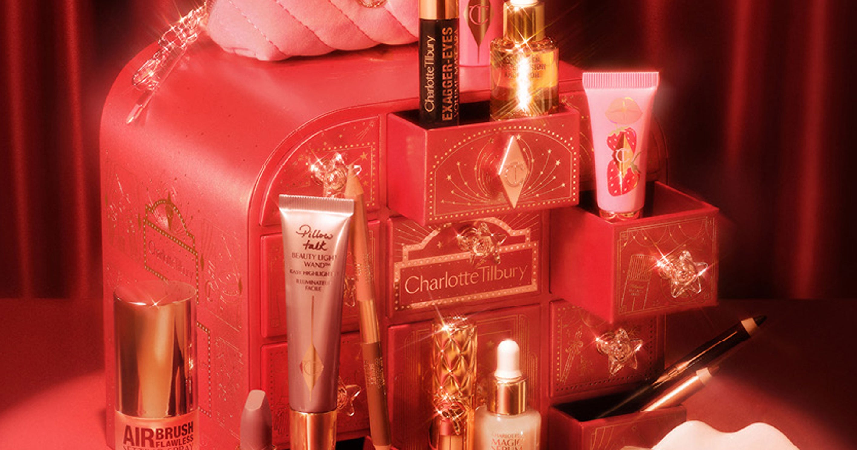 Assorted luxury beauty products arranged for the holiday season