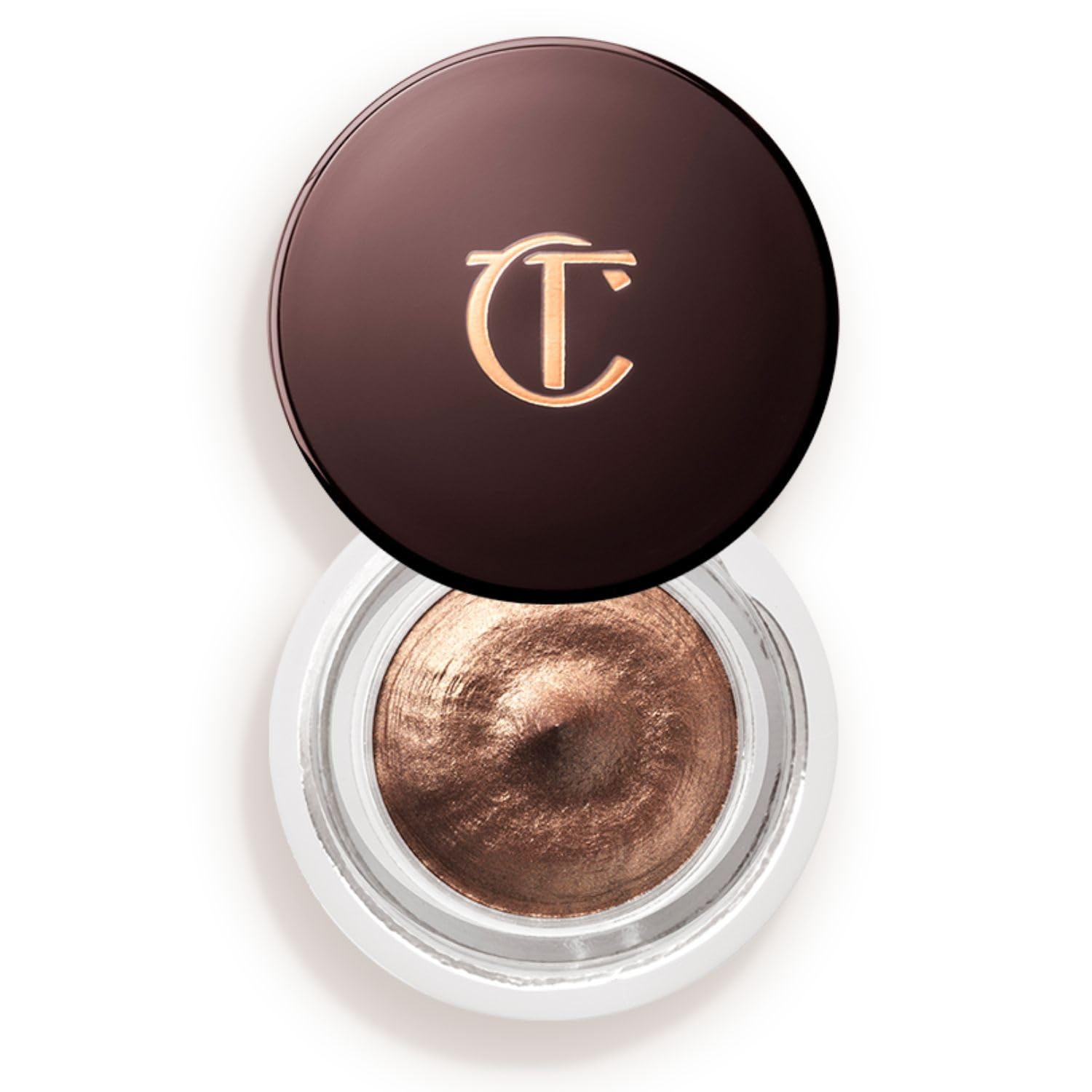 Close-up of shiny lip gloss product on a pale background